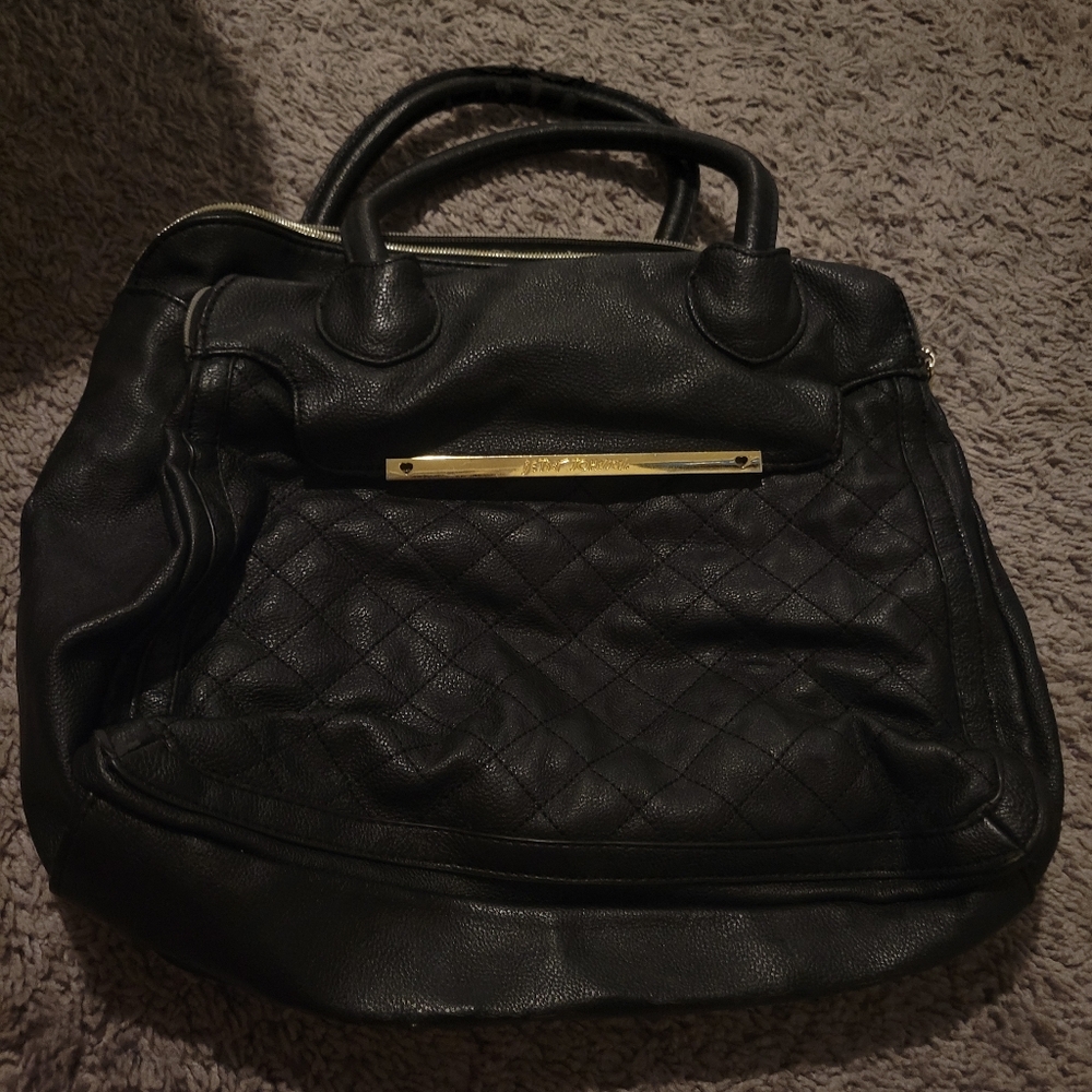 Chic Black Quilted Handbag with Gold Accents